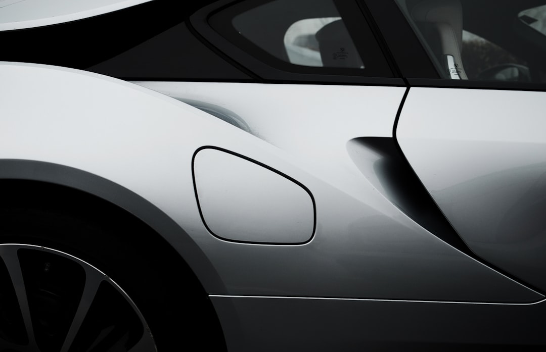 A background image of a modern car.